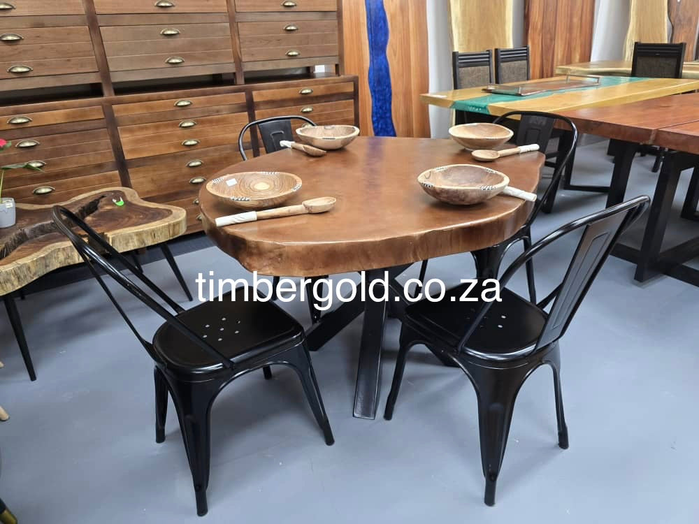 Live edge African maple, finished in Mahogany.