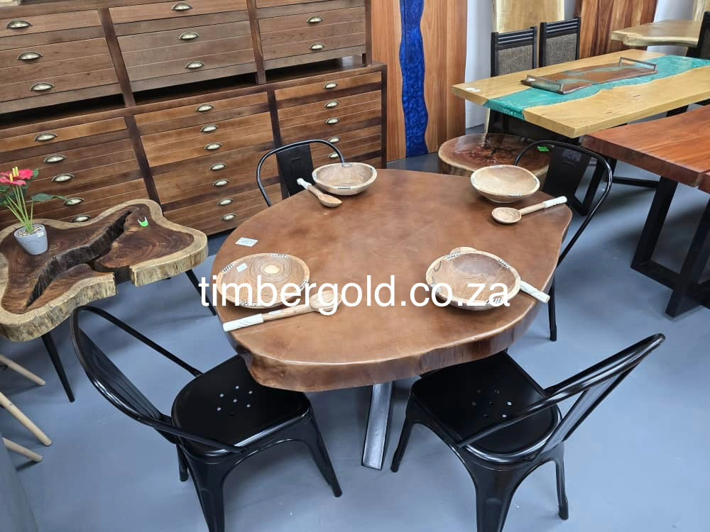 Live edge African maple, finished in Mahogany.