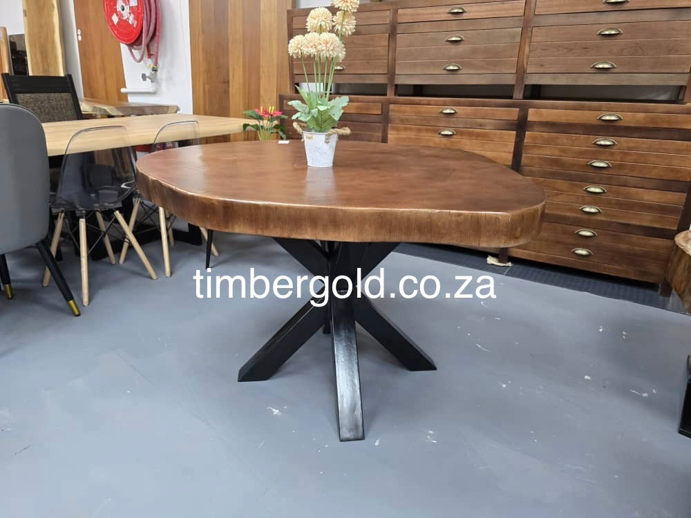 Live edge African maple, finished in Mahogany.