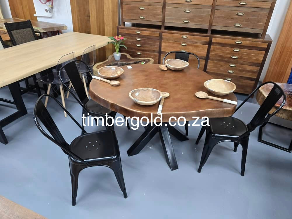 Live edge African maple, finished in Mahogany.