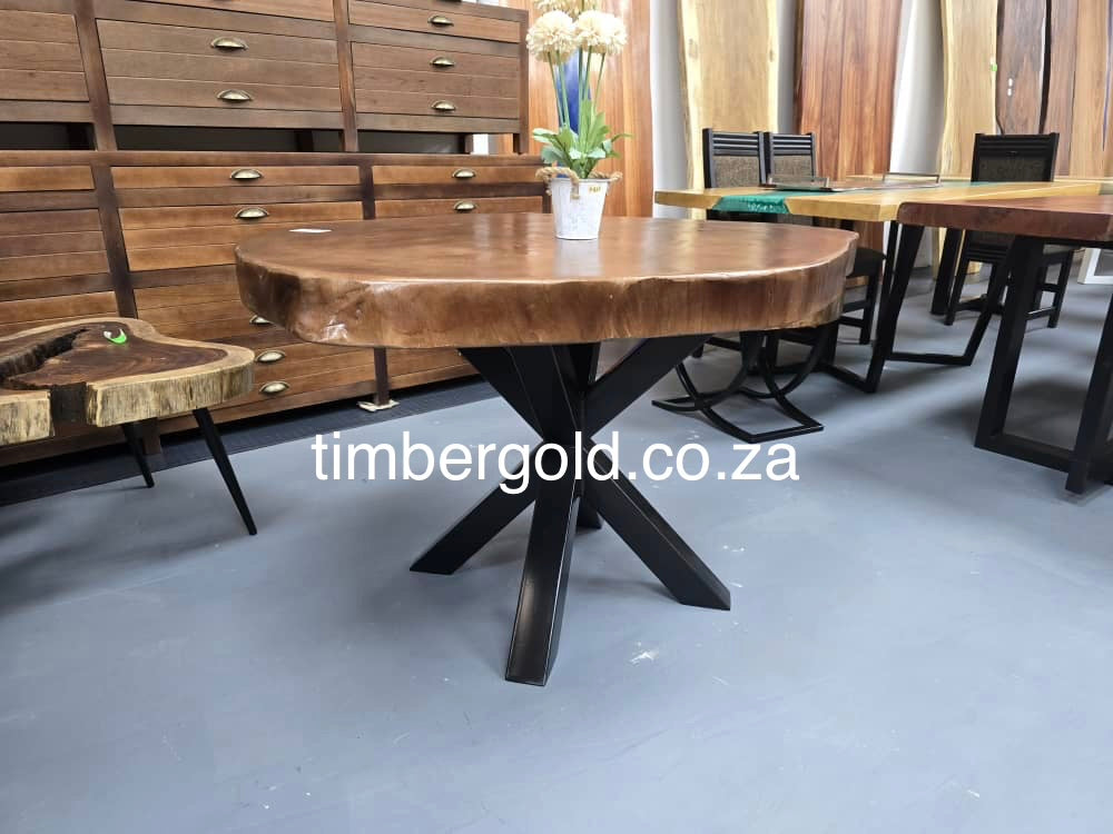 Live edge African maple, finished in Mahogany.