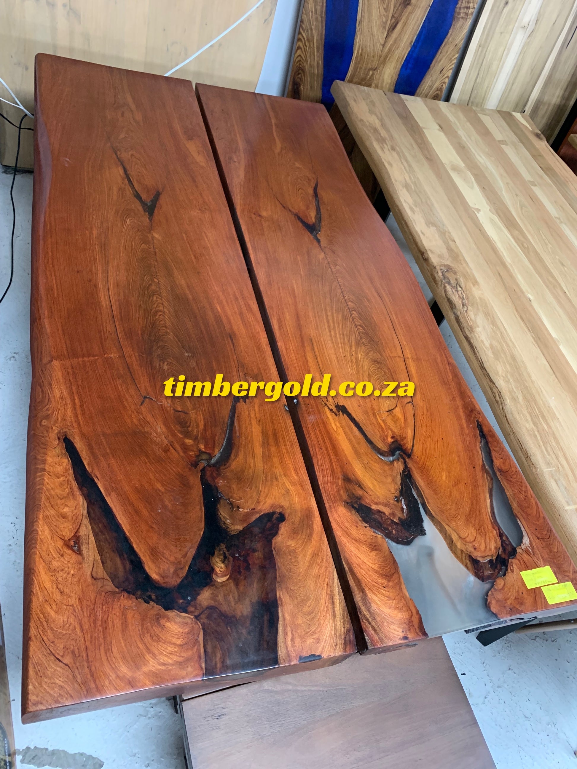 Rosewood and clear epoxy resin table