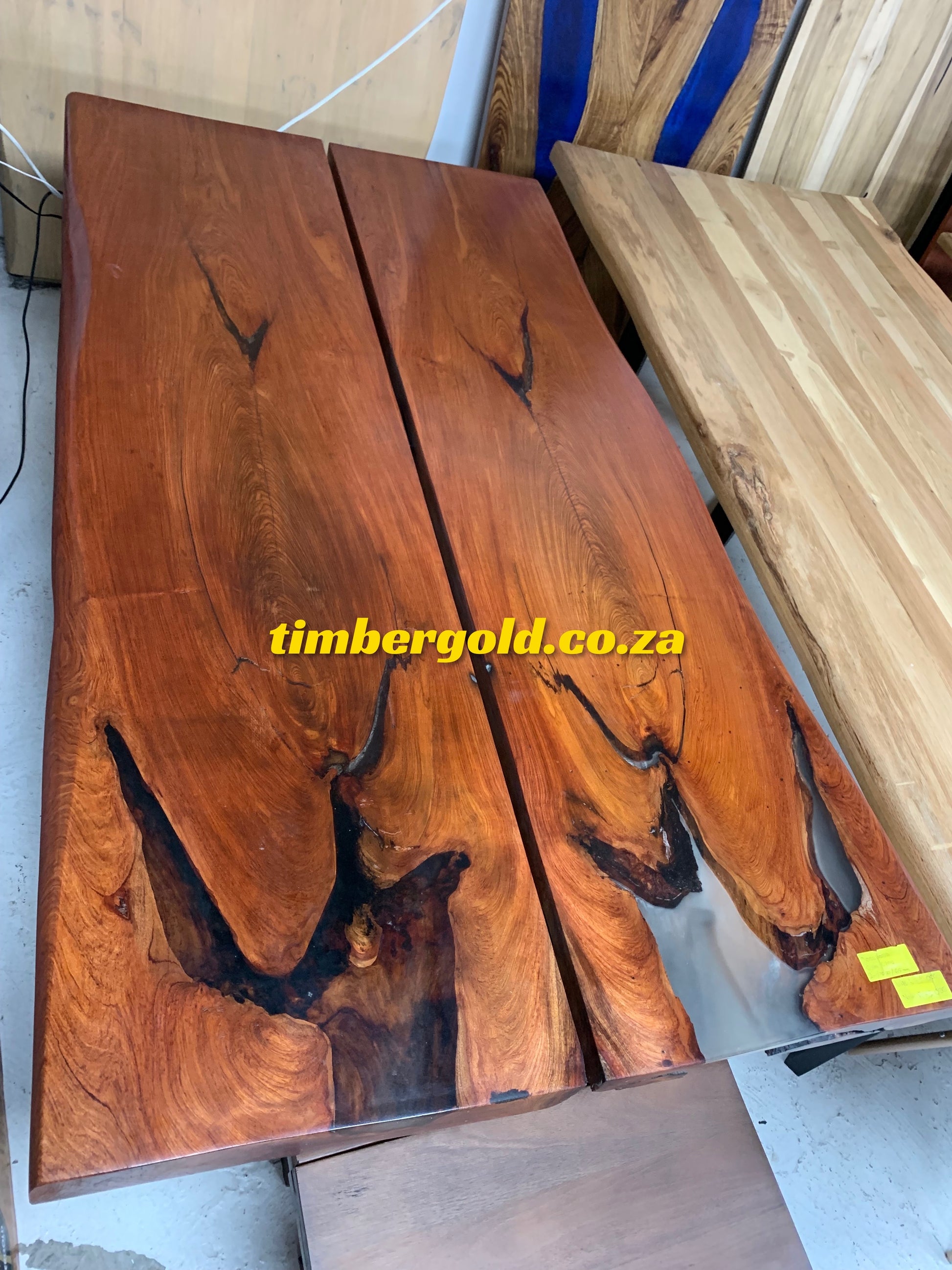 Rosewood and clear epoxy resin table