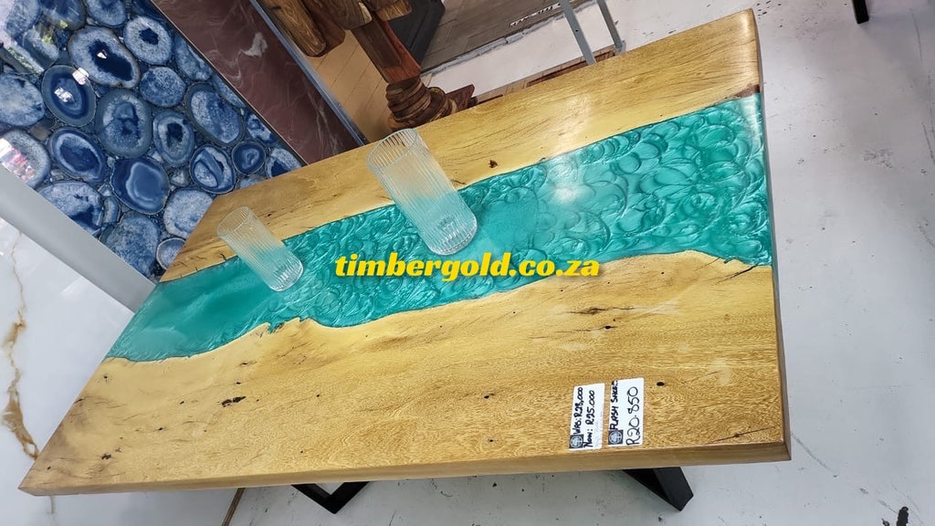 Wild teak with light blue epoxy resin