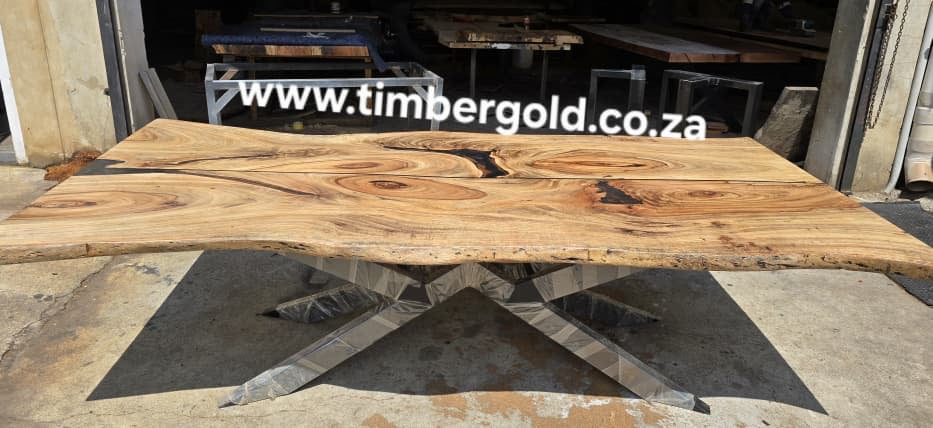 Live edge African Wild Oak, with mini-black epoxy resin.