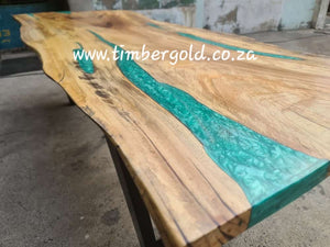 Live edge African Golden Walnut with green epoxy resin