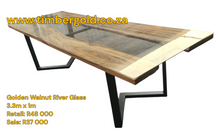 Load image into Gallery viewer, Golden walnut table with glass top
