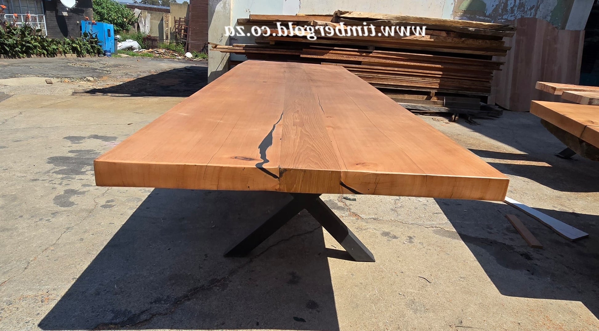 Live edge African maple with Oak insert.