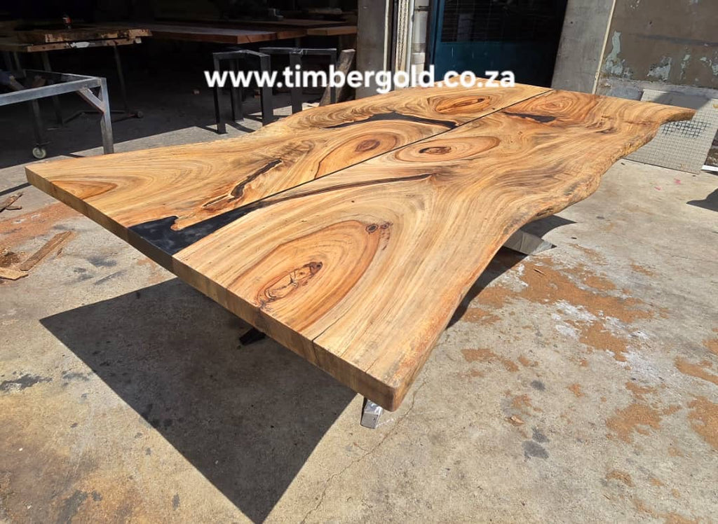 Live edge African Wild Oak, with mini-black epoxy resin.