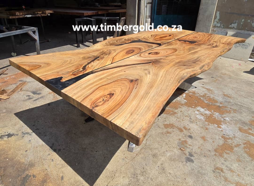 Live edge African Wild Oak, with mini-black epoxy resin.