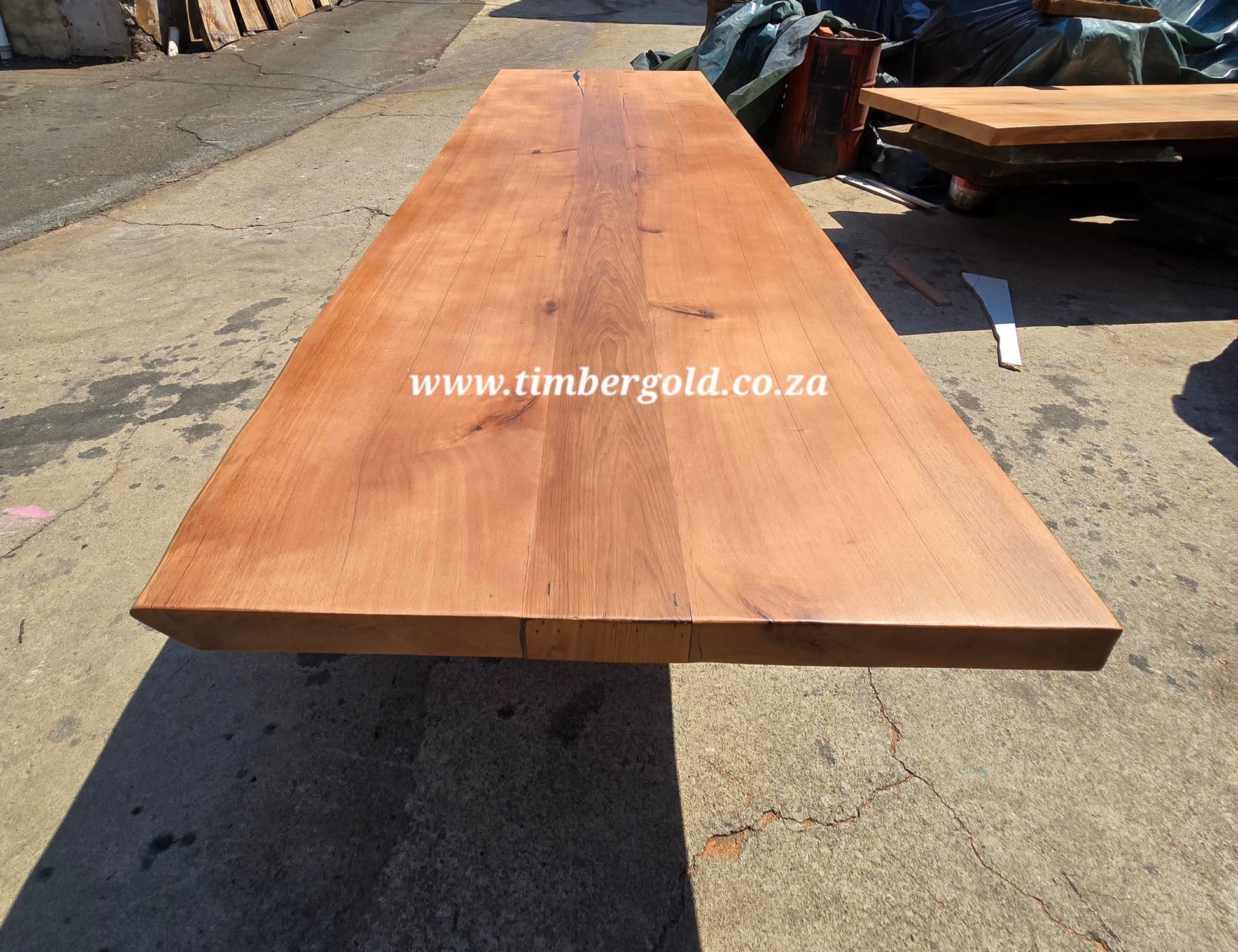 Live edge African maple with Oak insert.