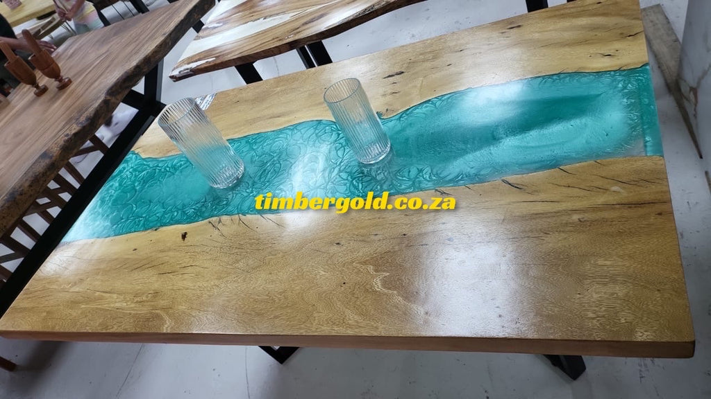 Wild teak with light blue epoxy resin