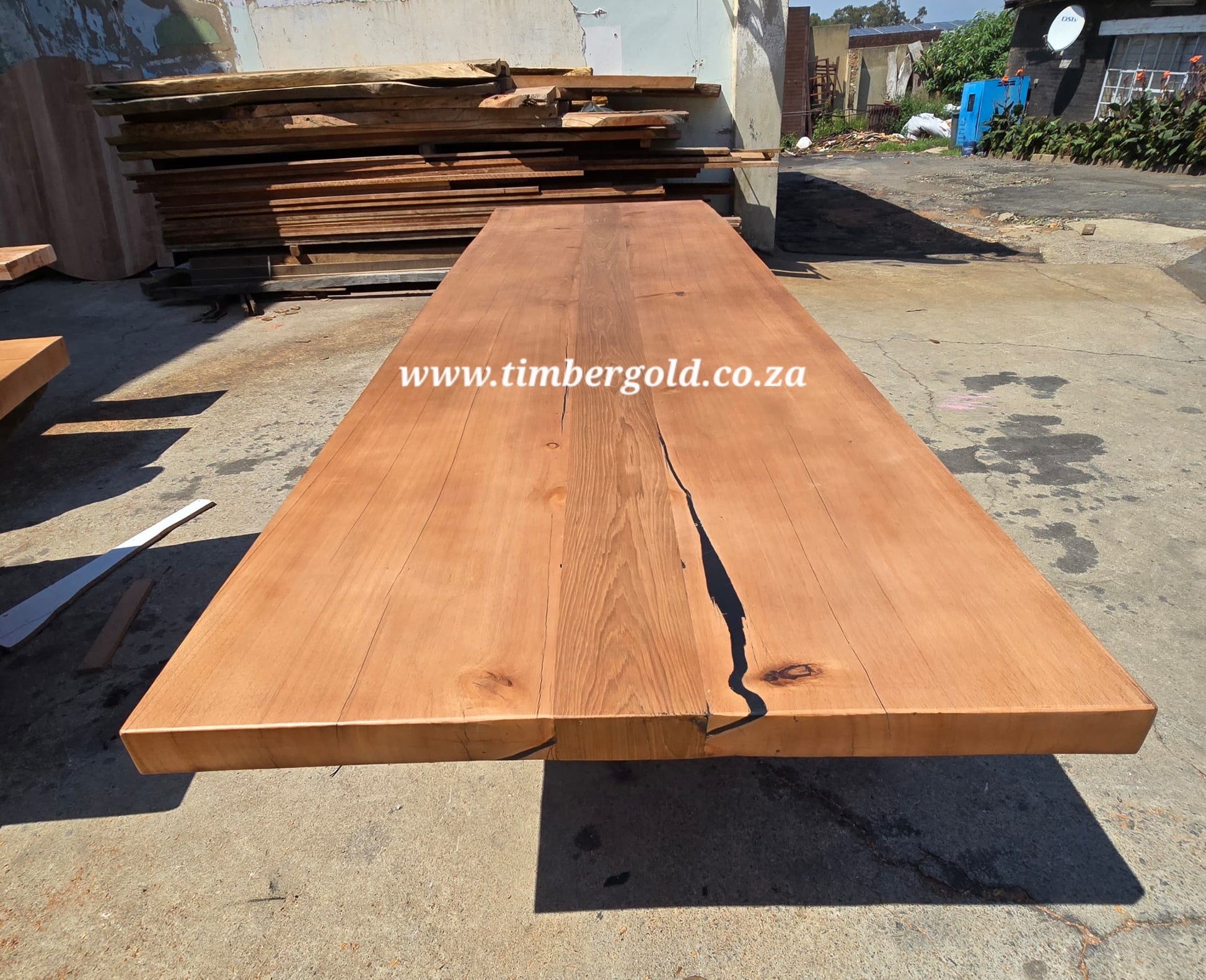 Live edge African maple with Oak insert.