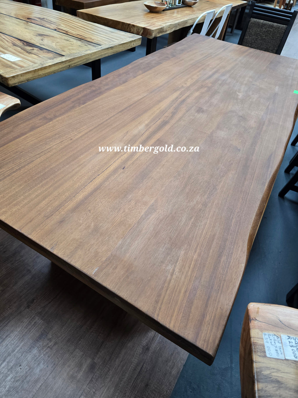 Semi Live edge IROKO Table.